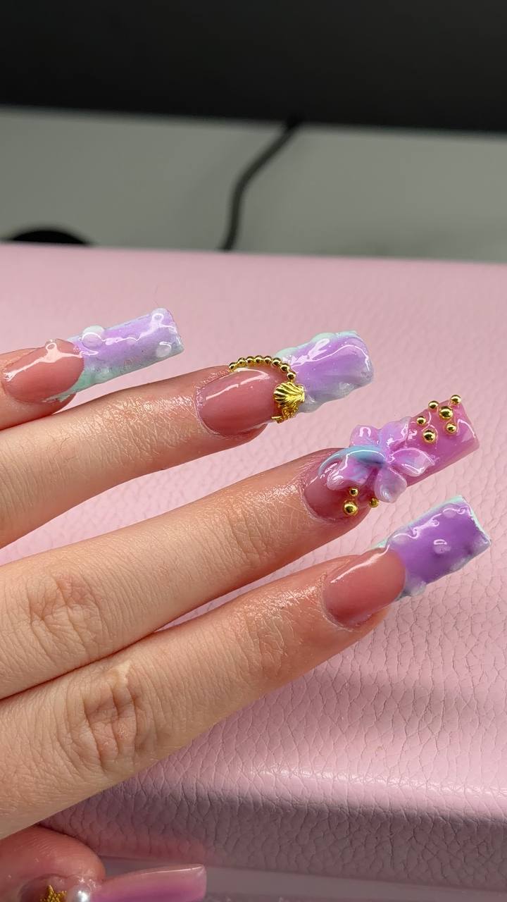 Purple ombre French tips with gold shell charm by Tay